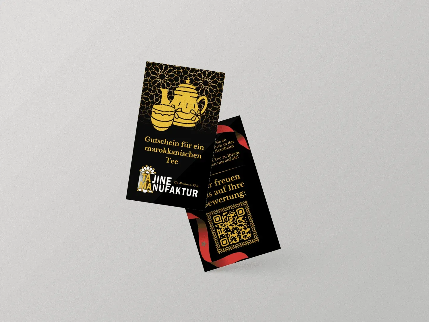 Schwarze Visitenkarten der Tajine Manufaktur mit Goldprägung